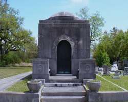 The place has a large number of mausoleums. The Brown mausoleum is the highest in the cemetery.